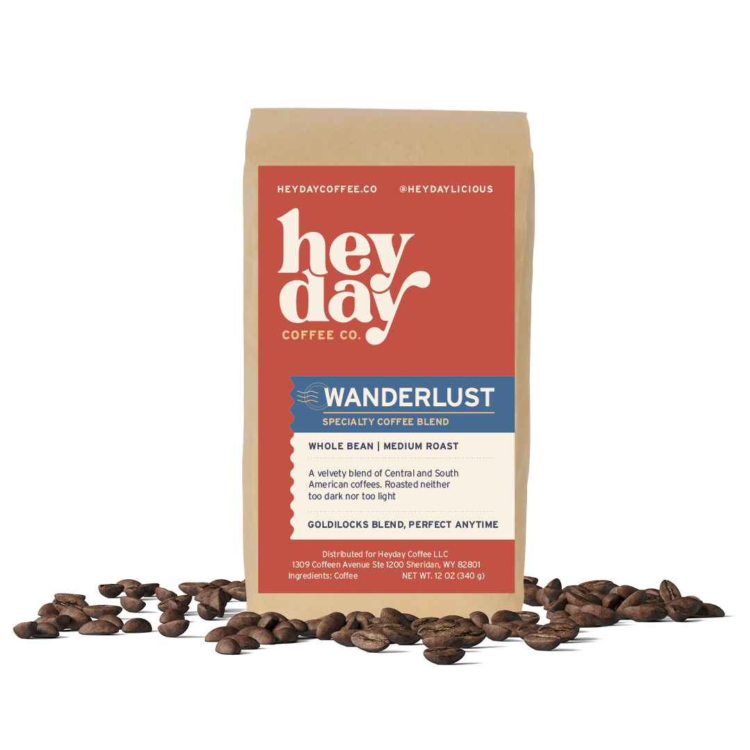 Wanderlust Blend - Bag on Bed of Beans - Heyday Coffee Co.